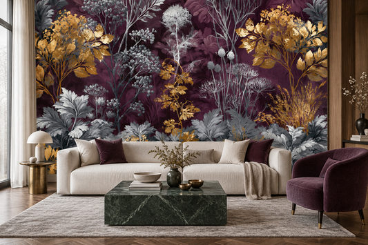 Aubergine and gold wildflower mural behind a cream sofa, a dark green marble coffee table and a plum velvet armchair in a living room