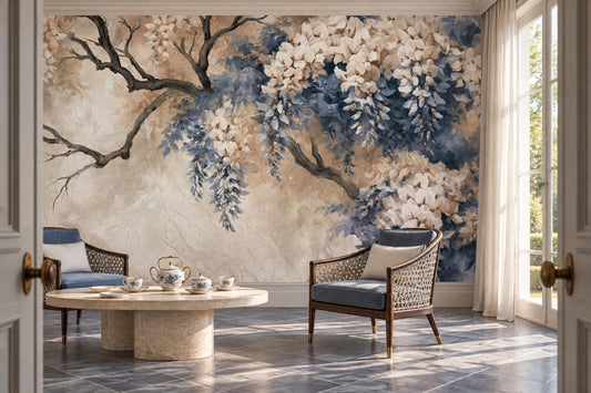 Ivory and blue blossom branch wall mural in a sitting room with a marble tea table and rattan armchairs