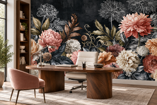 Dark floral mural with blush dahlias in a home office with a round walnut desk, a white chair and pink chairs beside a bookshelf
