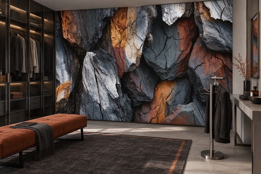 Layered slate stone texture mural in a dressing room with an orange tufted bench, a glass wardrobe and a clothes rail