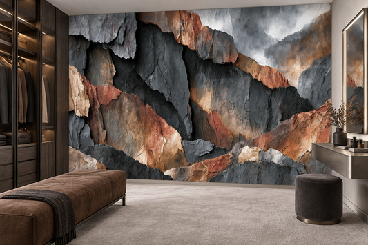 Abstract slate stone wall mural in a dressing room with a tan leather bench, a charcoal throw and a glass-front wardrobe