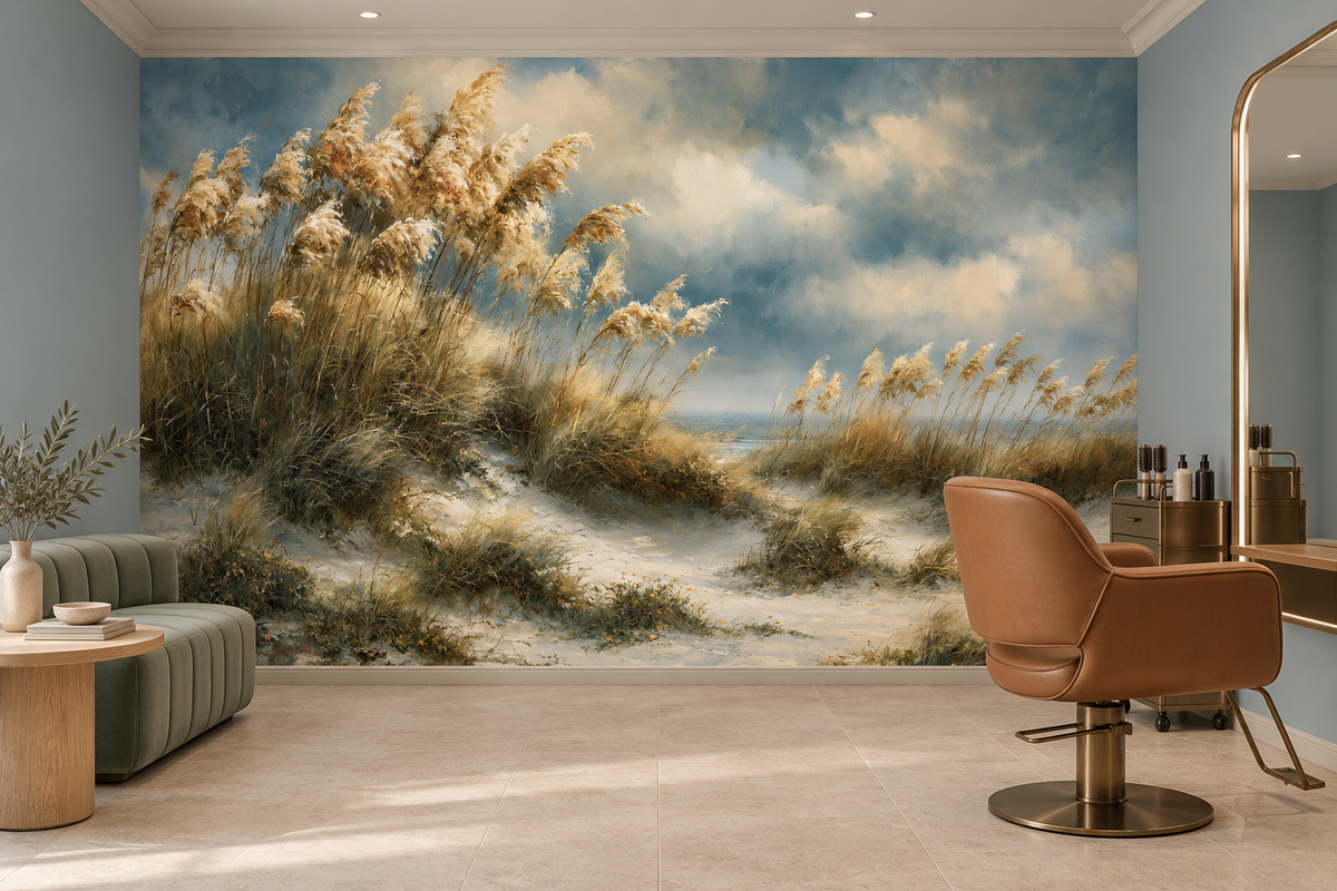 Coastal dune grass mural in a salon with a tan leather salon chair, a mirror vanity and a sage curved bench against pale blue walls
