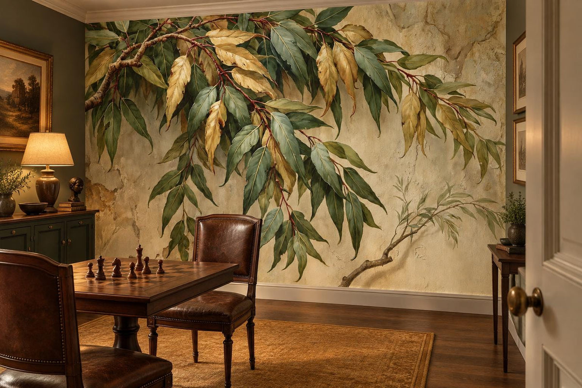 Vintage green and gold leaf mural in a library with leather chairs, a chess table and a green cabinet