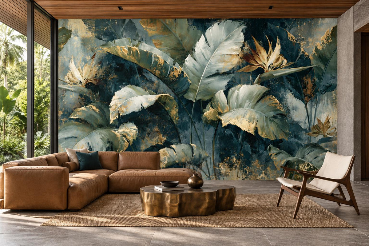 Teal and gold tropical leaf wallpaper mural behind a cognac leather sectional and a brass coffee table